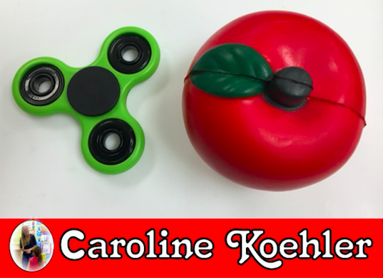 Fidget spinner and apple stress ball.