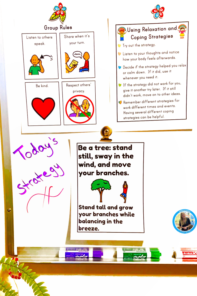3 posters on a teacher's wipe off board showing group rules, using relaxation and coping strategies, and "Today's Strategy" of Be a tree: stand still, sway in the wind, and move your branches as a way to teach topics for life skills.