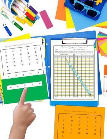 Letter recognition sheets for upper and lowercase letters with a student pointing.