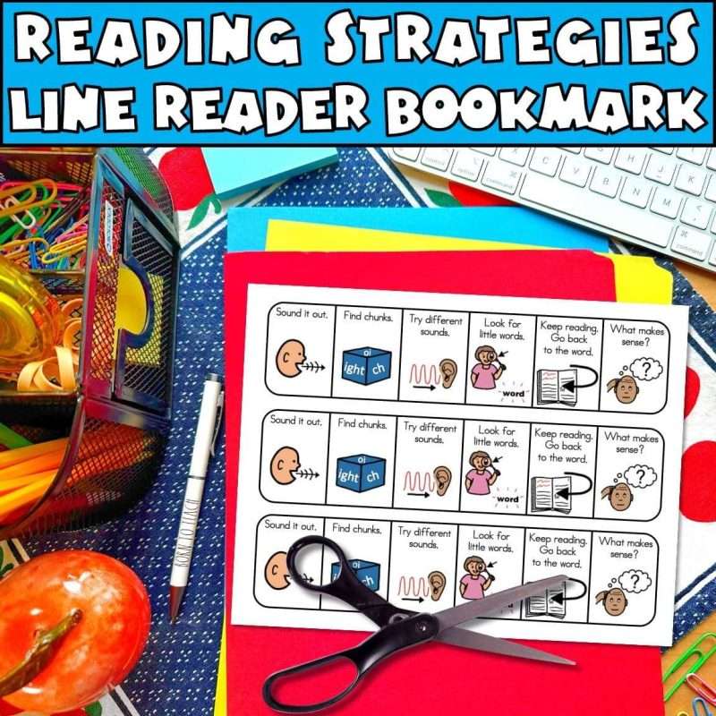 Reading strategies line reader bookmark on a teacher's desk with a pair of scissors.